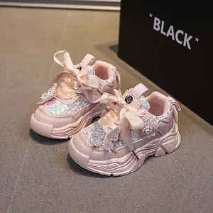 Pink toddler girls' sneakers with sequins, silk bow, and crystal butterfly accents