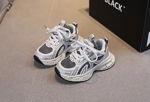 Close-up of kids breathable mesh sneakers with chunky anti-slip soles and silver panels