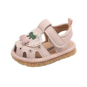 Pink baby girl sandals with cherry embroidery and soft non-slip soles for toddlers