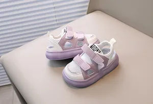 Detail of purple mesh toddler sandals with dual velcro straps and anti-slip soft soles
