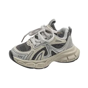 Breathable mesh kids sneakers in grey and silver with durable non-slip thick soles