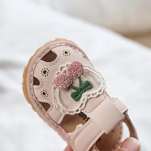 Pink baby girl summer sandals with cherry embroidery and soft sole closed-toe design