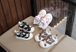 Detail of toddler sandals with breathable mesh, protective toe caps and velcro straps