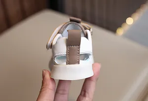 Detailed view of baby sports sandals featuring breathable hollow-out design and soft heel