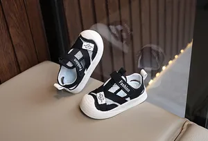 Detail of baby sports sandals featuring breathable mesh and a protective white rubber toe cap