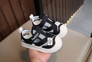Close-up of baby summer sandals with breathable mesh and protective rubber toe caps