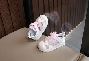 Close-up of pink toddler mesh sandals with breathable fabric and fashion velcro strap