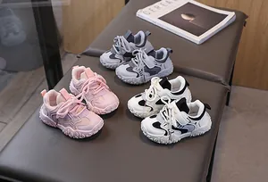 Detailed view of breathable kids' mesh sneakers with non-slip thick soles in multi-colors