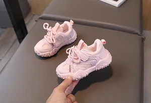Detail of pink kids' breathable mesh sneakers with anti-slip thick soles and velcro