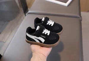 Close-up of lightweight children's sports shoes with velcro straps and gum soles