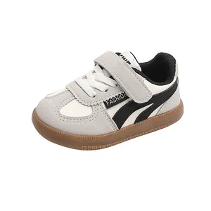 Kids vintage sneakers with grey suede, white leather, and anti-slip rubber gum soles