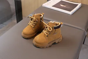 Detail view of children winter boots with warm plush lining and side zipper feature