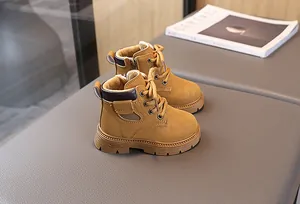Detail view of khaki children boots featuring warm plush lining and a non-slip rubber sole