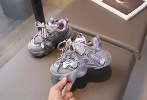 Detail of warm plush lining and purple faux leather on children's chunky winter sneaker