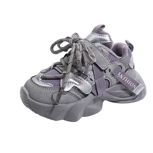Winter chunky sneakers for kids featuring gray and purple faux leather and plush lining