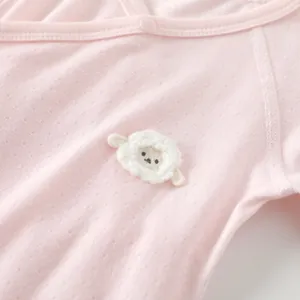 Pink bamboo fiber baby romper with hollow jacquard texture and sheep applique details