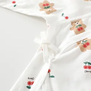 Newborn baby cotton bodysuit with cute brown bear and cherry prints with side tie details