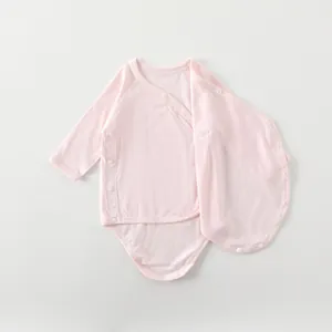Bamboo fiber long sleeve baby bodysuit in soft pink with side snap closures