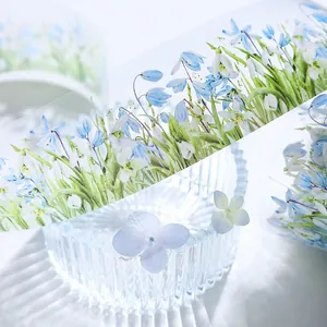 Cinta decorativa PET tema jardín de invierno con patrones florales azules y campanillas