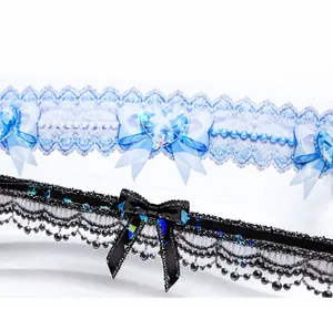 Lace tape with bow and pearl pendants featuring iridescent shell shine and special oil finish