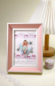 Detailed view of DIY scrapbooking lace and pearl stickers with matching decorative washi tape