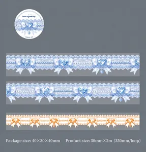 Detail of Deep Sea Gem PET tape showing blue lace, bows, and shell light effect