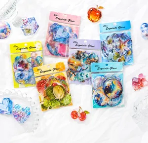 Exquisitos adhesivos PET efecto cristal con motivos florales y estelares para manualidades