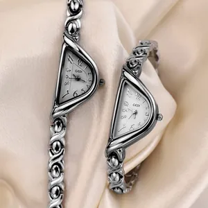 Elegant silver GEDI quartz watch with unique half-moon dial and luxury chain strap
