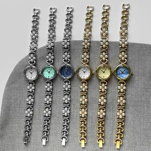 Elegant ladies quartz watches with pearl bands and floral links in six assorted colors