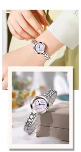 Détail d'une montre vintage argentée avec cadran en nacre rose pour femmes