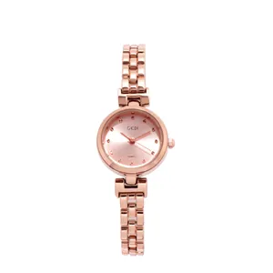 Rose gold women's watch with rhinestone-studded bezel and stylish metal link chain