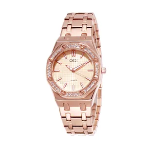 Montre luxe à quartz pour femme en or rose avec lunette octogonale et cadran à treillis