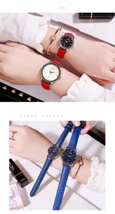 Dettaglio dell'orologio al quarzo con cinturino in pelle e set di bracciali con diamanti