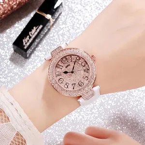 GEDI fashion women's quartz watch featuring a crystal-encrusted bezel and white leather strap