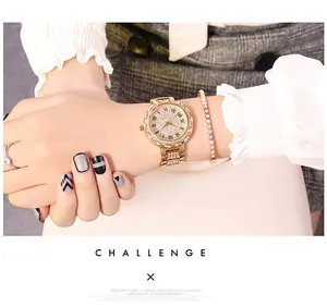 Detailed shot of rose gold starry watch and matching crystal bracelet on a female wrist