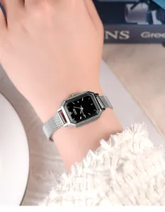 Close-up of elegant silver rectangular watch with black dial and Milanese mesh strap