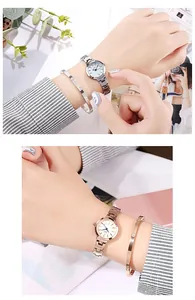 Close-up of minimalist women watch with matching metal bracelet set in rose gold and silver