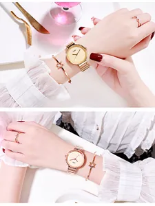 Detail of rose gold alloy quartz watch set with bamboo strap and star motif bracelet