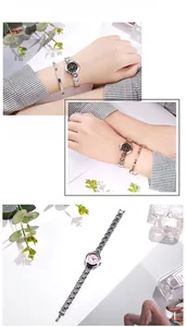 Close-up of minimalist women's steel mesh watch and bracelet set on a wrist