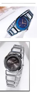 Dettaglio del quadrante in vetro sfaccettato e cinturino in metallo traforato per orologio