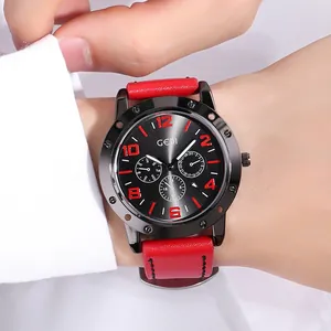 GEDI men's quartz watch with black dial, red markers and matching leather strap on wrist