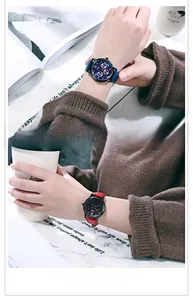 Detail shot of multi-functional leather strap watches in navy blue and classic red colors