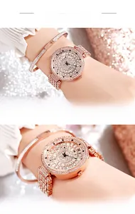 Détail de montre rose doré avec verre minéral, placage IP et cristaux scintillants