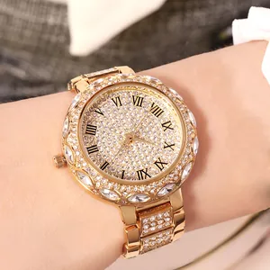 Luxury gold women's quartz watch with crystal-encrusted starry dial and metal link band