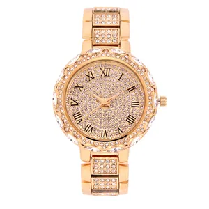 Luxurious gold women's watch featuring a crystal-encrusted dial and Roman numeral markers