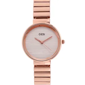Elegant rose gold women's quartz watch with bamboo link strap and white textured dial