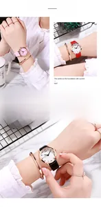 Detail of elegant ladies quartz watch with floral dial pattern and leather strap
