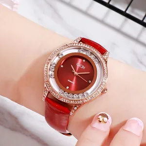 Montre à quartz luxe rose gold pour femme avec cadran rouge et lunette sertie