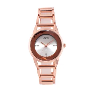 Orologio da donna in oro rosa con indici in diamanti e lunetta in vetro geometrico