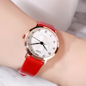 Elegant GEDI women's watch with red leather strap and floral pattern dial on wrist